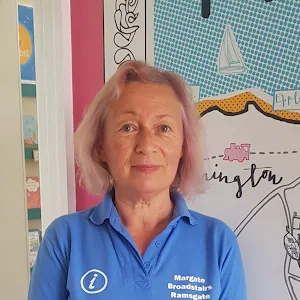 Lady stood in front of doorway entrance