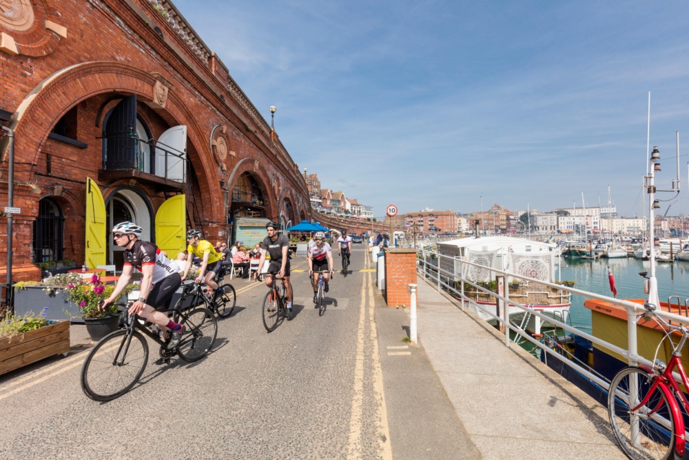 People-riding-bikes-pass-Ramsgate-Arches.-Credit-@VisitThanet