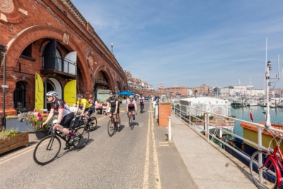 People-riding-bikes-pass-Ramsgate-Arches.-Credit-@VisitThanet