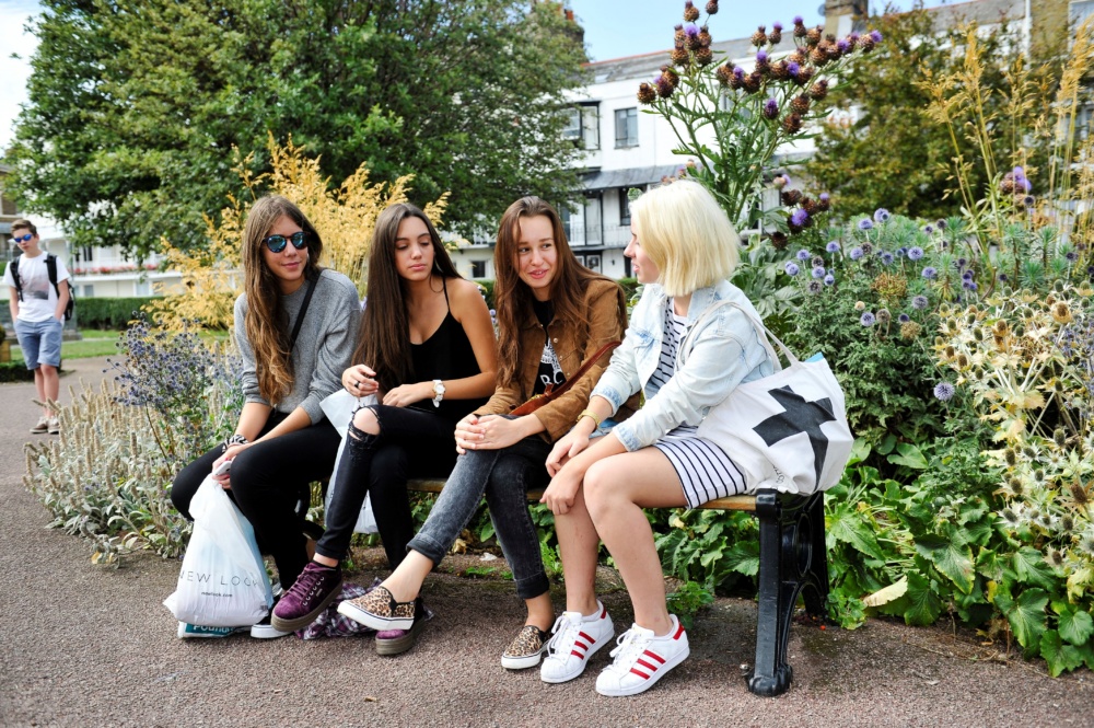 Girls-sat-on-bench-Ramsgate-Laugage-School.-Credit-@VisitThanet