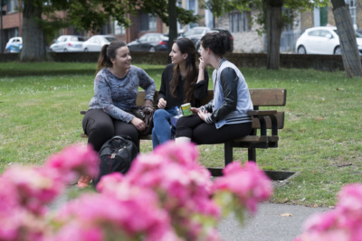 Students-on-bench-with-flowers-in-foreground-Margate-Language-School.-Credit-@VisitThanet