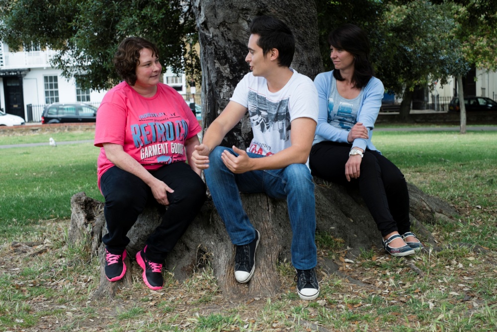 Students-sat-on-tree-stump-Margate-Language-School.-Credit-@VisitThanet