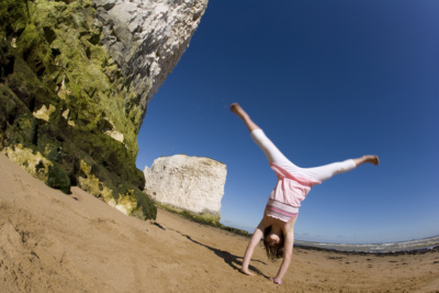 Botany Bay Broadstairs girl handstand. Credit @VisitThanet